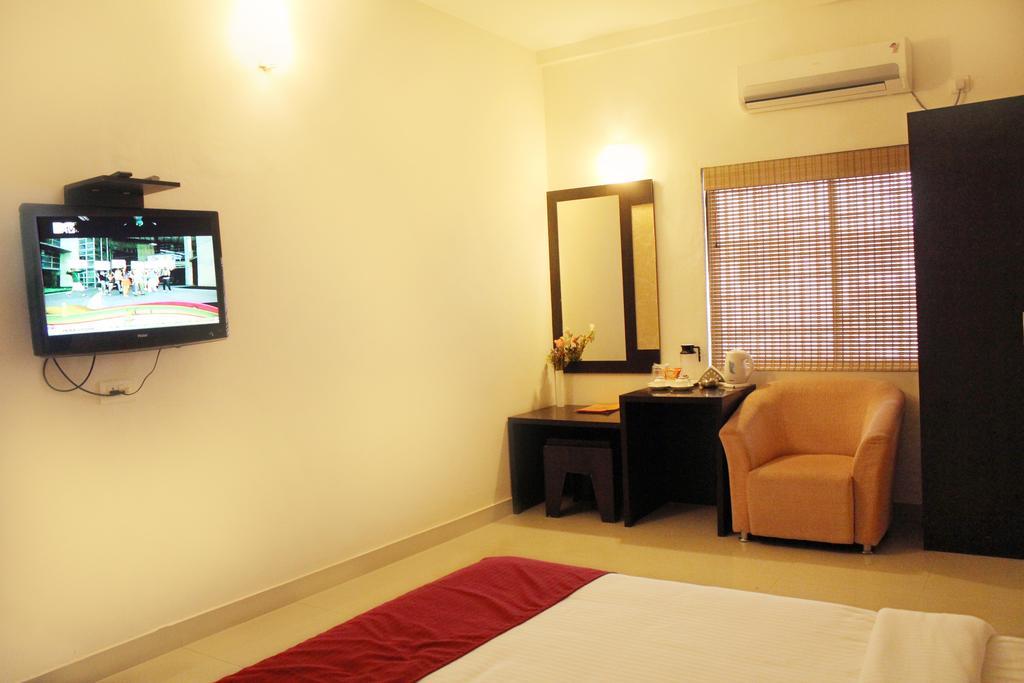 Hotel Sk Elegance Mysore Værelse billede