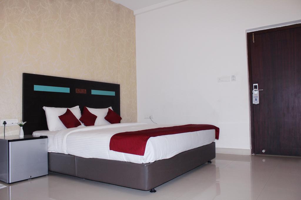 Hotel Sk Elegance Mysore Værelse billede