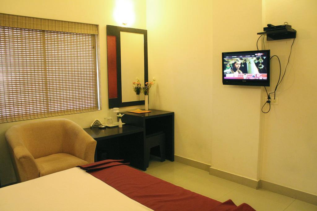 Hotel Sk Elegance Mysore Værelse billede