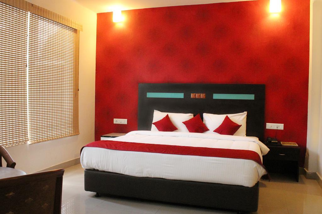 Hotel Sk Elegance Mysore Værelse billede